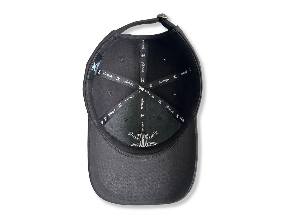 Stylish Black Broqui hat featuring the iconic Coquí symbol in black, inspired by Puerto Rican heritage.